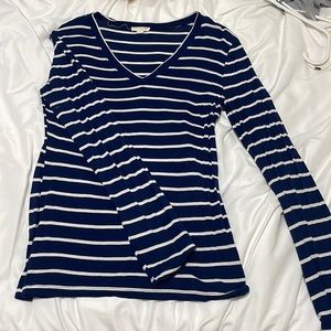 Blue and white, tight fitting shirt